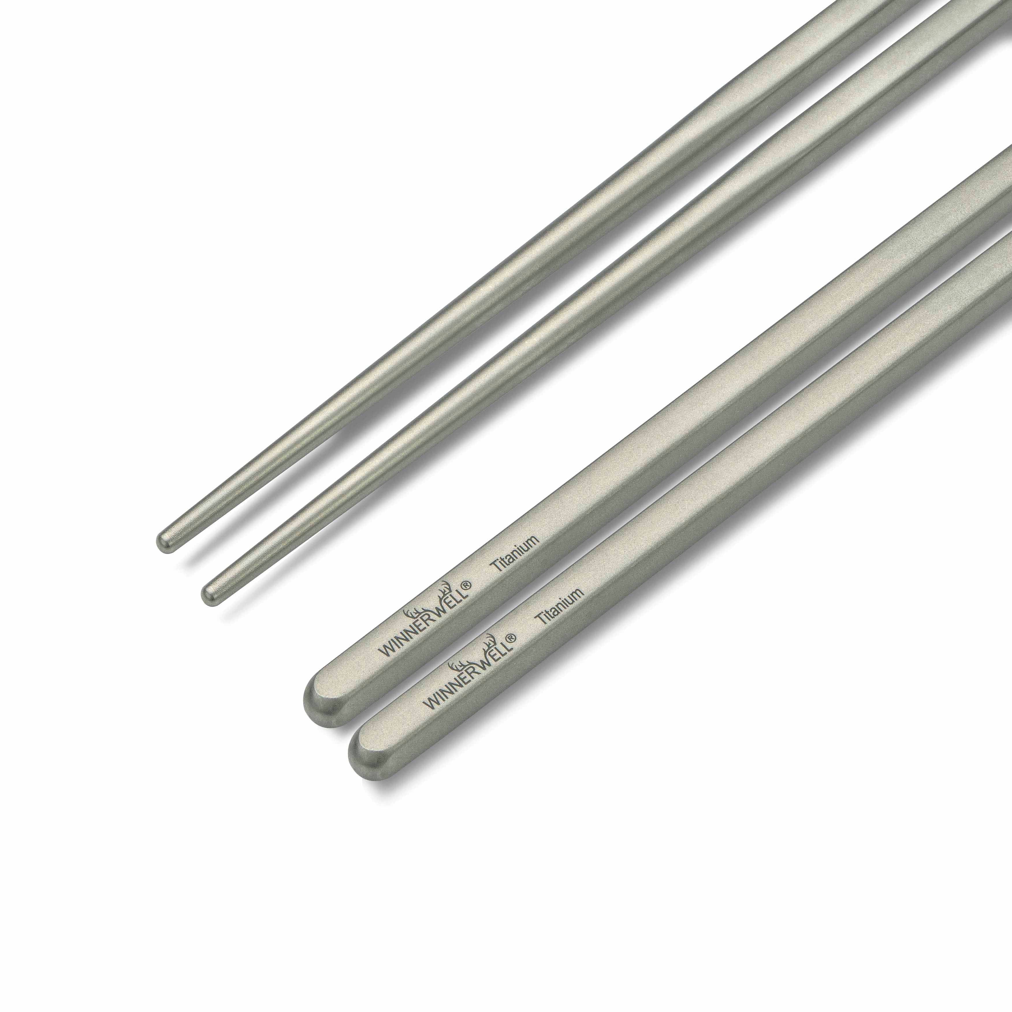 A close - up end - on view of Winnerwell® square titanium chopsticks, clearly showing the square cross - section of the chopsticks.