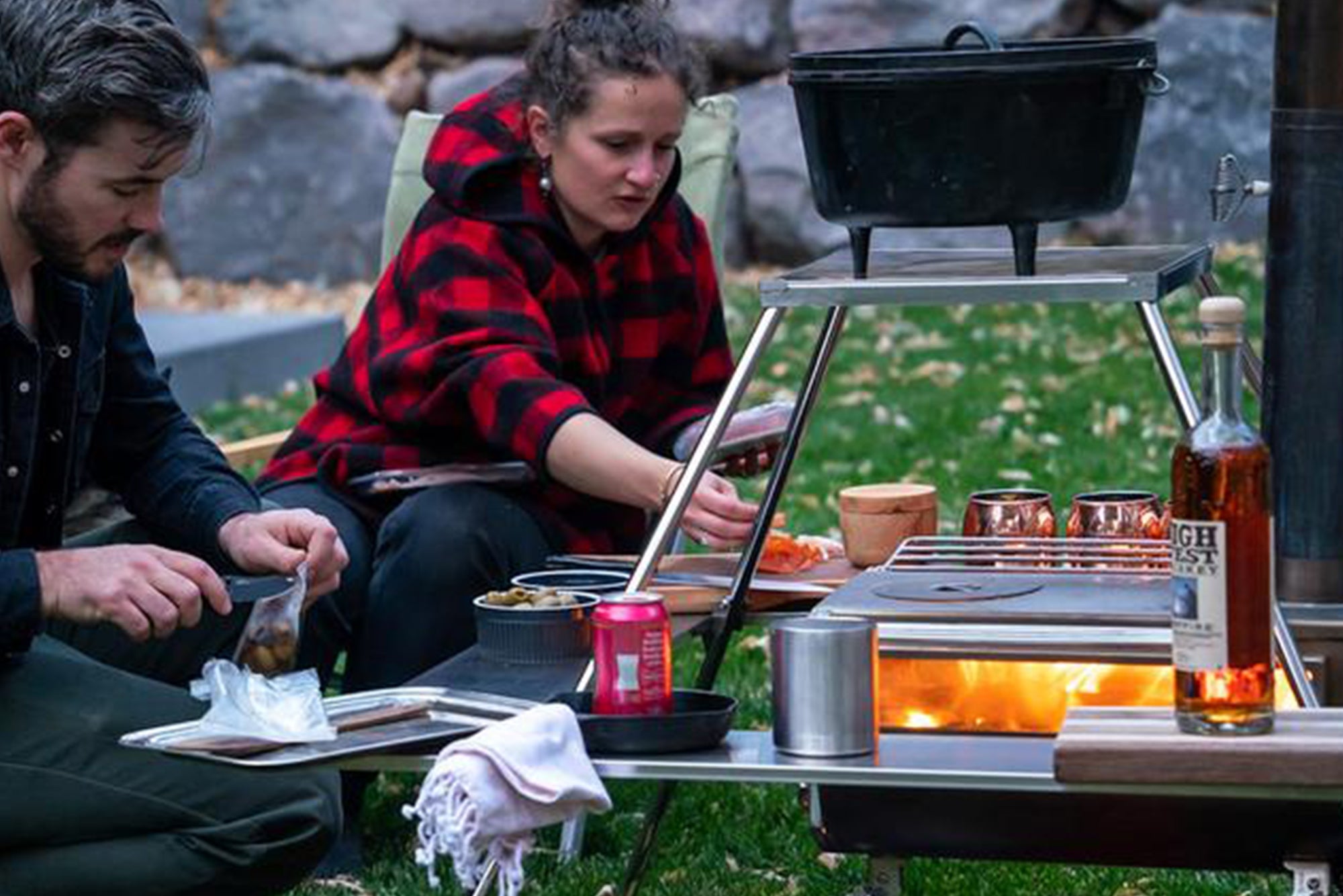 Why is Tipi tent more suitable for use with wood-burning stoves?
